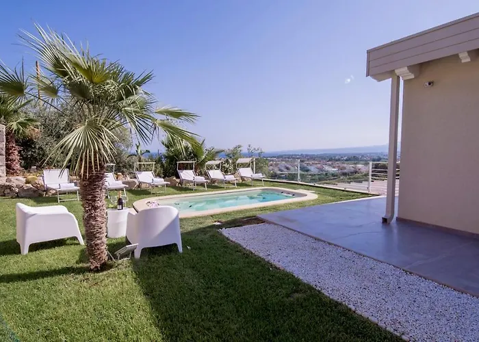 Aura 6, Emma Villa Giardini Naxos